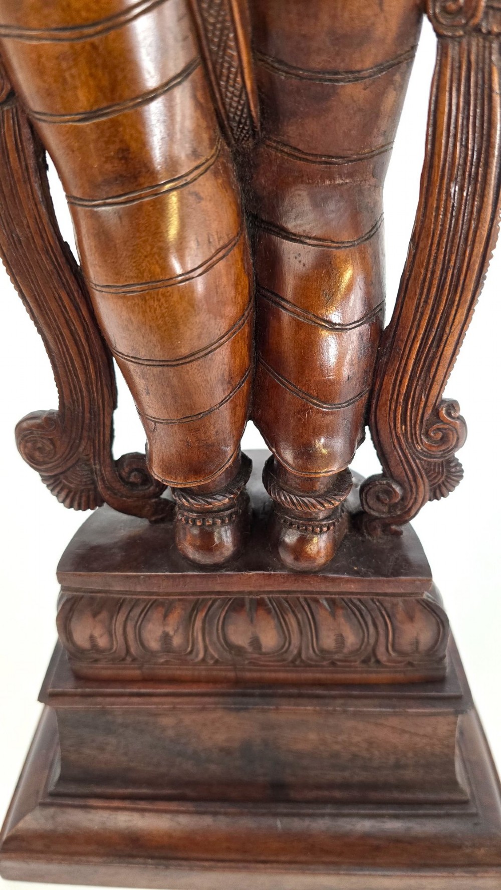 A hand-carved dark wood statue depicting the Goddess Parvati holding infant Ganesha, mounted on an octagonal wooden base. View XI