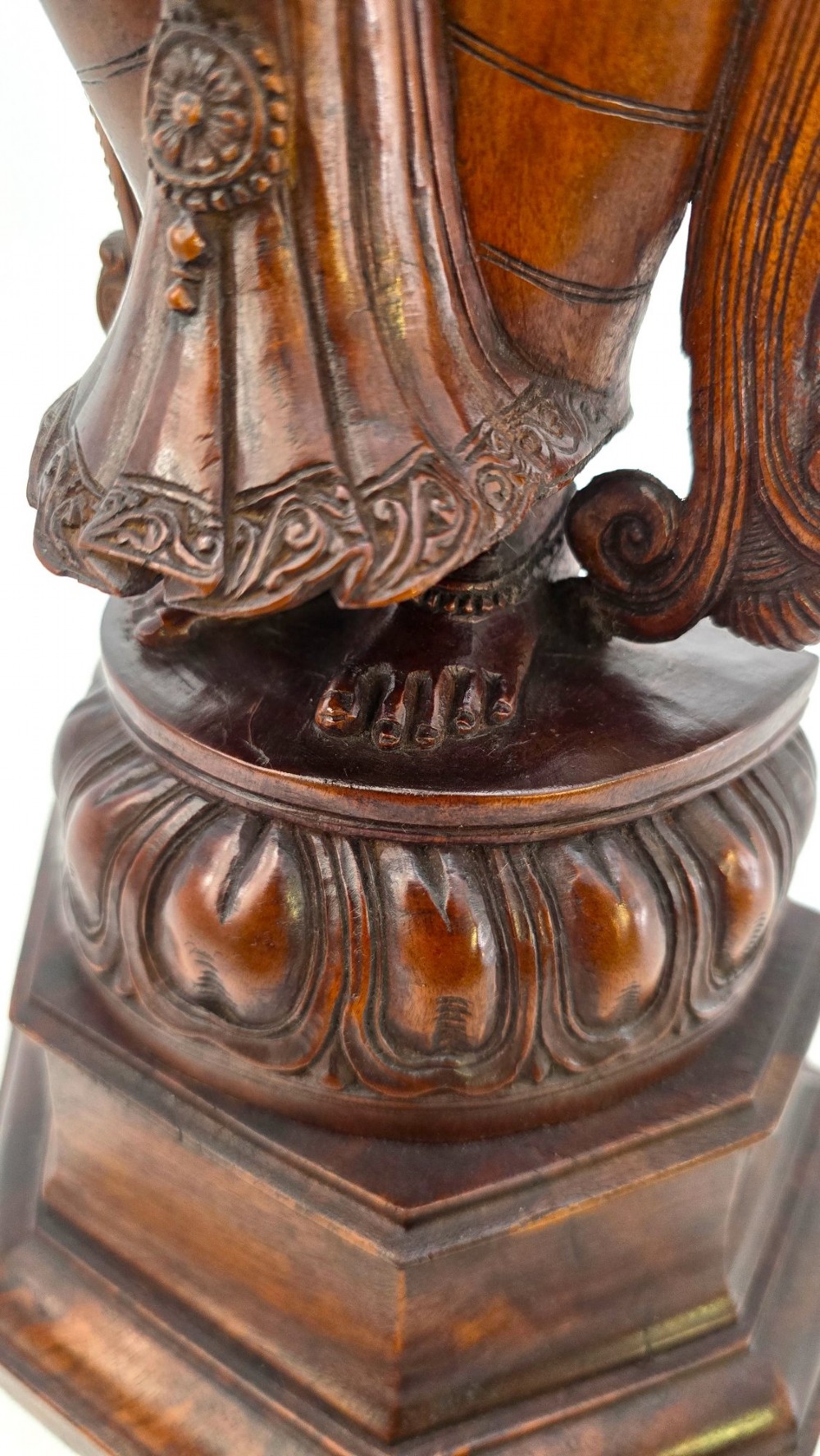 A hand-carved dark wood statue depicting the Goddess Parvati holding infant Ganesha, mounted on an octagonal wooden base. View XII