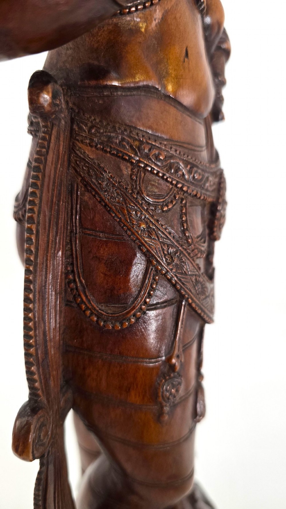 A hand-carved dark wood statue depicting the Goddess Parvati holding infant Ganesha, mounted on an octagonal wooden base. View XIII