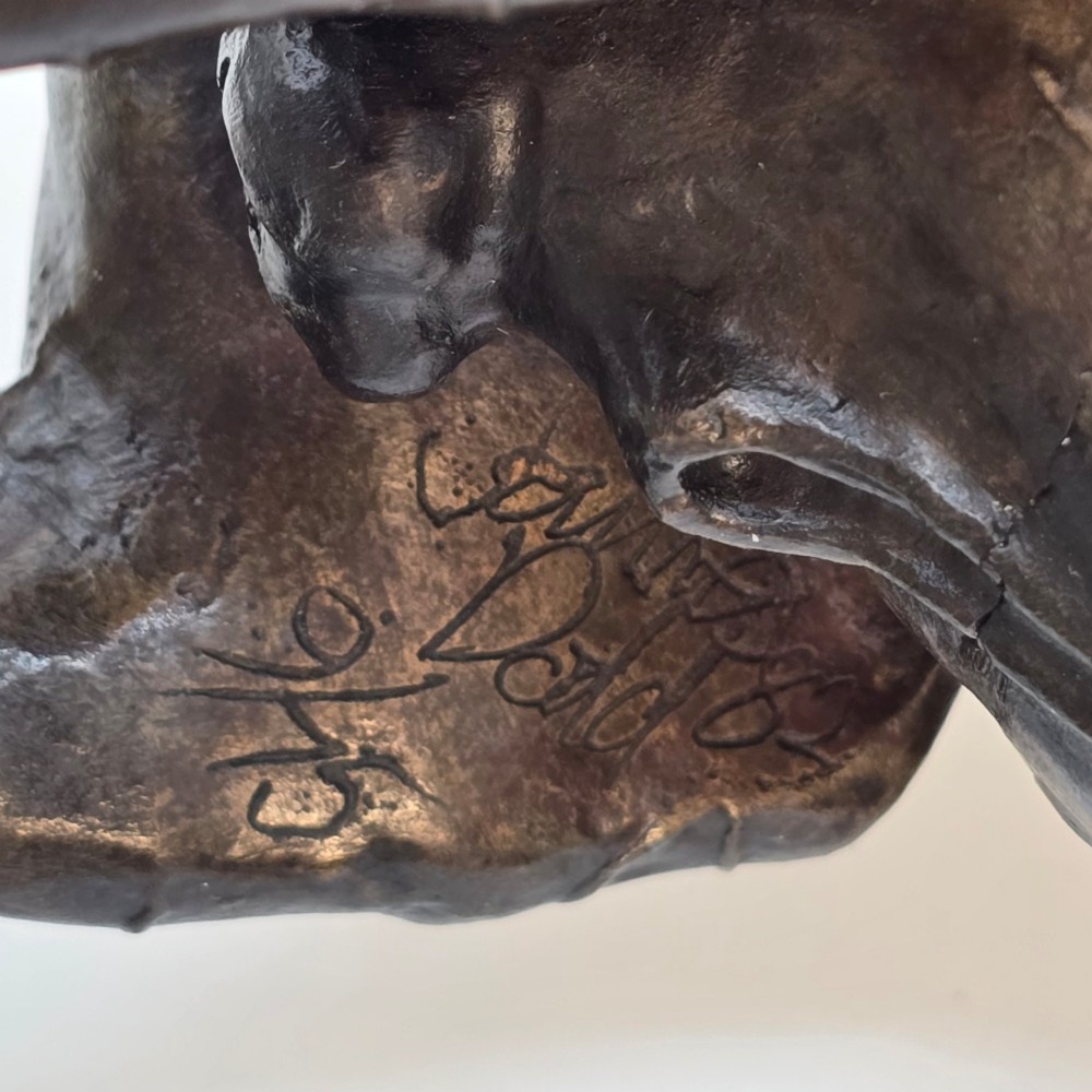 A dark bronze equestrian sculpture depicting a uniformed rider atop a rearing horse, mounted on a rectangular cream marble plinth. View XIII