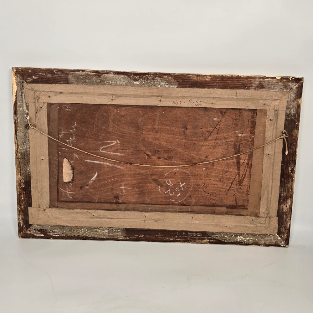 A framed rectangular silk needlework picture depicting figures gathered at the Epsom racecourse within an ornate gilded frame. View XI