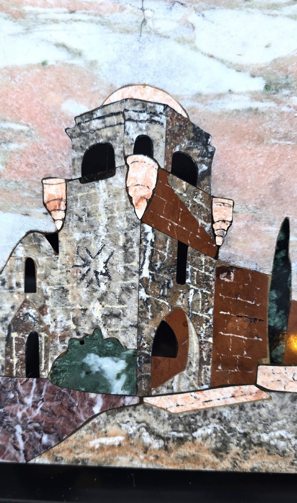 A framed Italian pietra dura panel depicting a stone building and cypress trees rendered in inlaid coloured marble. View III