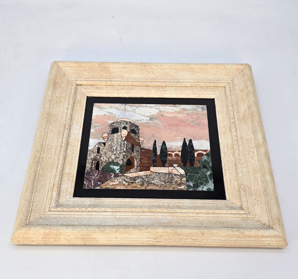 A framed Italian pietra dura panel depicting a stone building and cypress trees rendered in inlaid coloured marble. View XIII