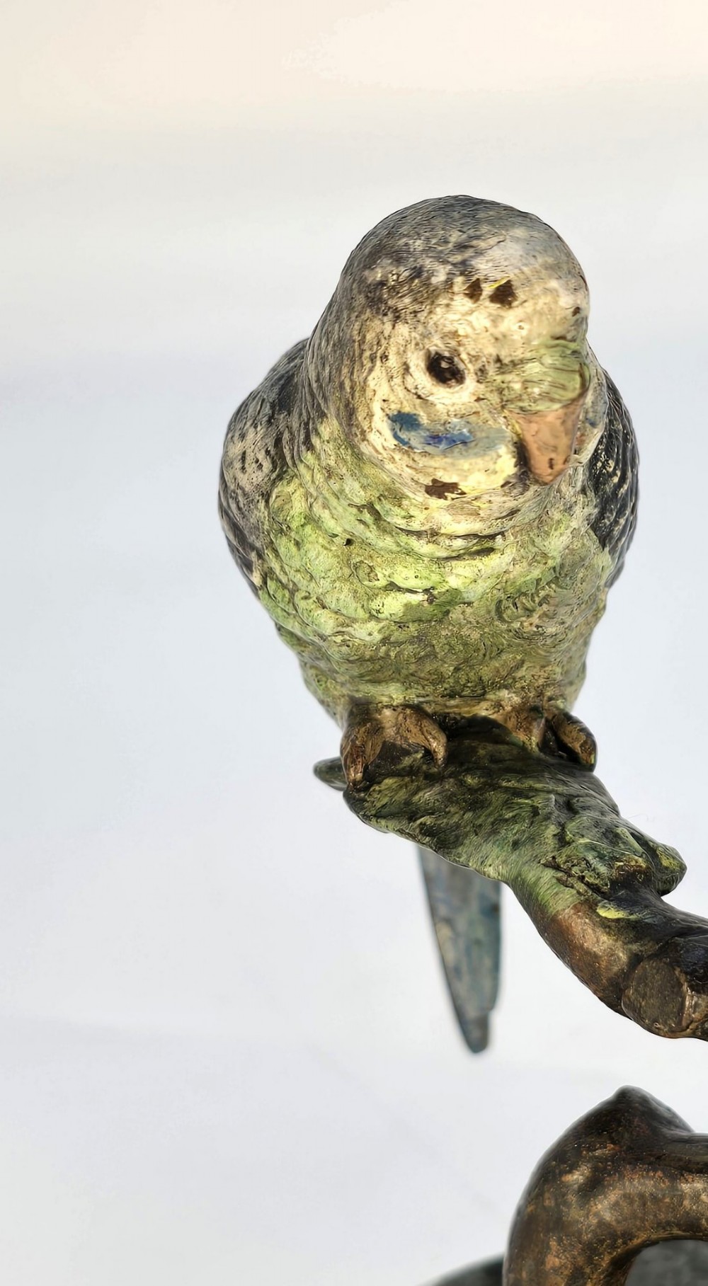 A cold-painted bronze sculpture featuring two budgerigars perched on a branch mounted upon a round green marble base. View XIII