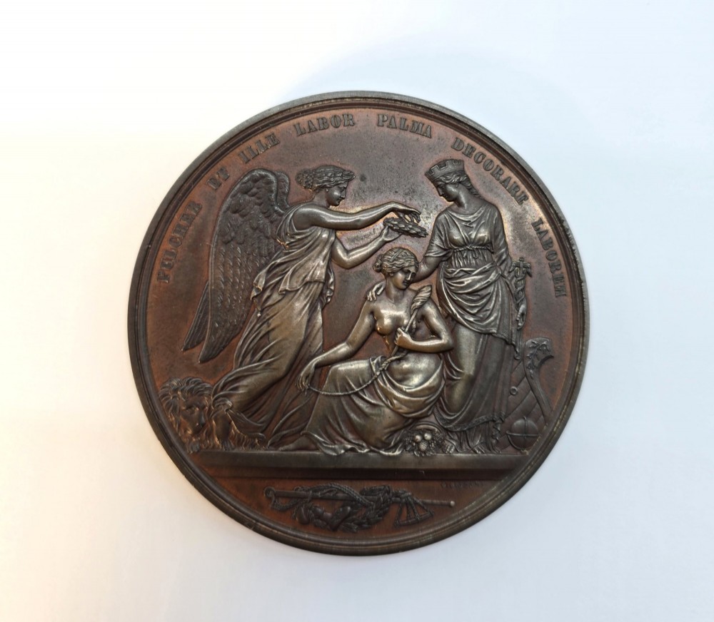 A circular dark bronze Victorian medal displaying jugate profile portraits of Queen Victoria and Prince Albert surrounded by Latin text. View II