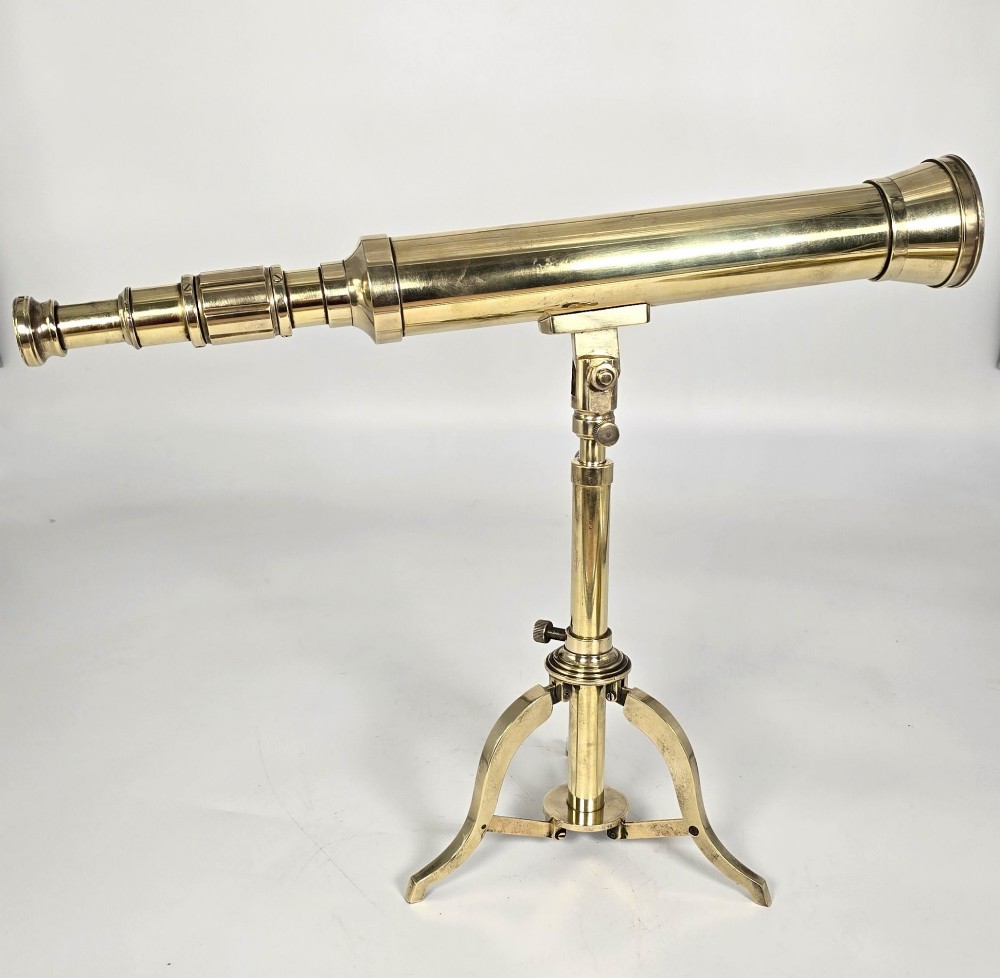 A Victorian brass table telescope mounted on a folding brass tripod stand. View III