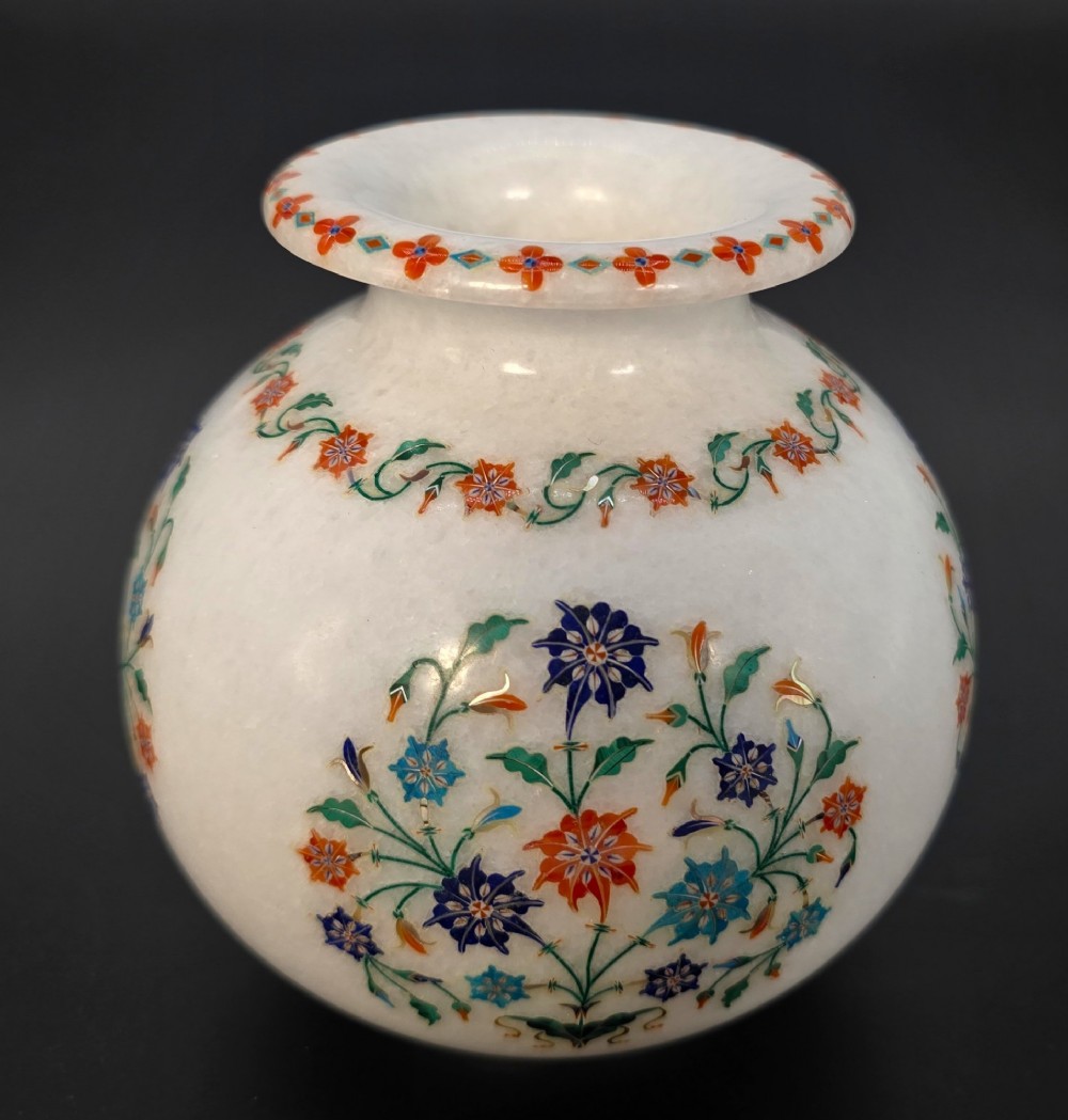 A globular white marble vase decorated with colourful floral inlays made from semi-precious stones. View II