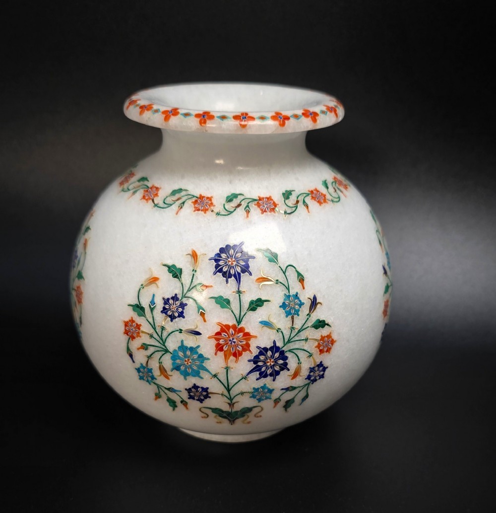A globular white marble vase decorated with colourful floral inlays made from semi-precious stones. View III
