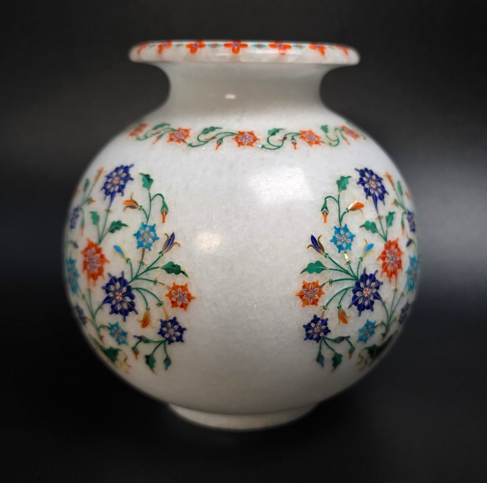 A globular white marble vase decorated with colourful floral inlays made from semi-precious stones. View IV