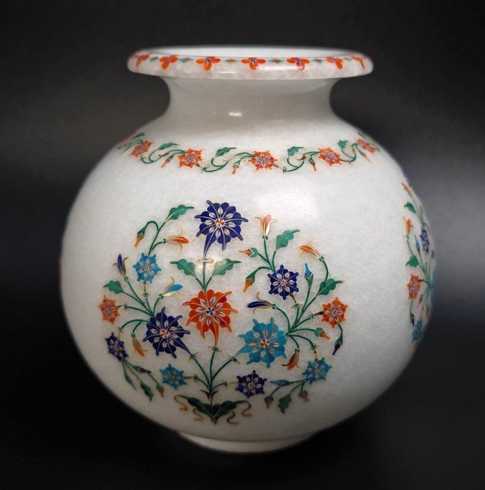 A globular white marble vase decorated with colourful floral inlays made from semi-precious stones. View V