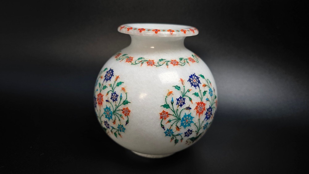 A globular white marble vase decorated with colourful floral inlays made from semi-precious stones. View VI