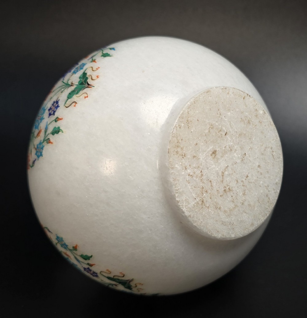 A globular white marble vase decorated with colourful floral inlays made from semi-precious stones. View VIII