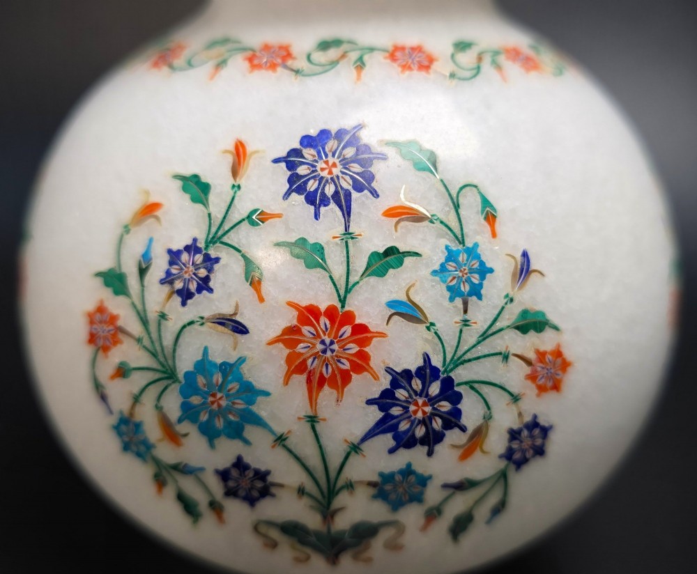 A globular white marble vase decorated with colourful floral inlays made from semi-precious stones. View XII