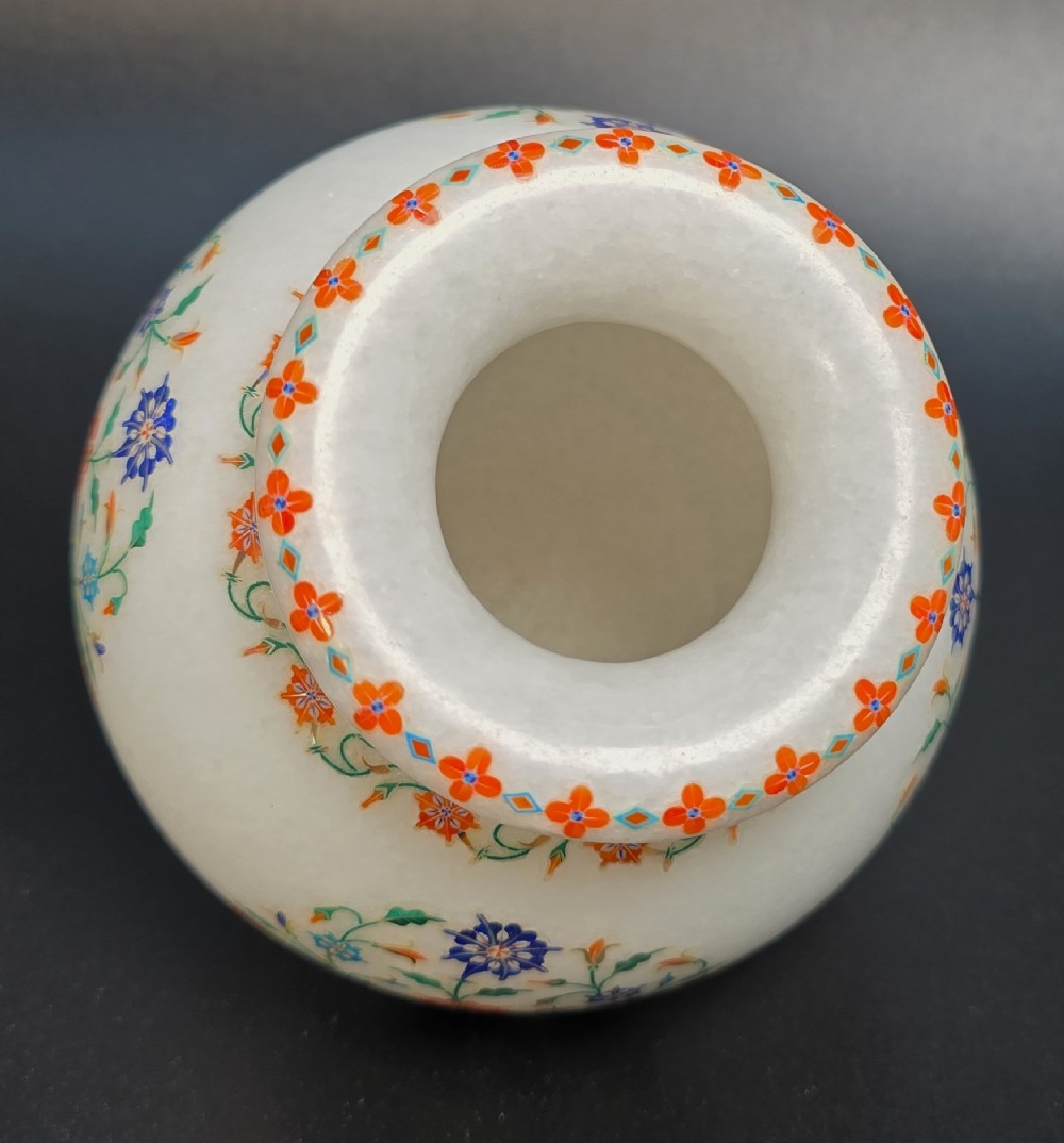 A globular white marble vase decorated with colourful floral inlays made from semi-precious stones. View XIII