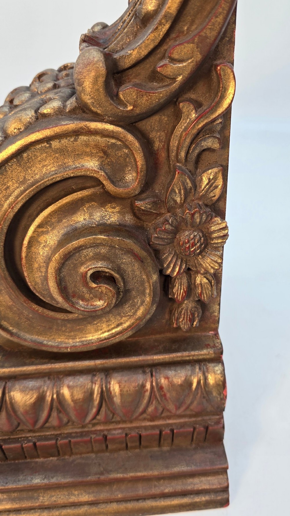 Pair of ornate Italian carved giltwood wall brackets featuring palmette leaf motifs and scrollwork finish. View IX