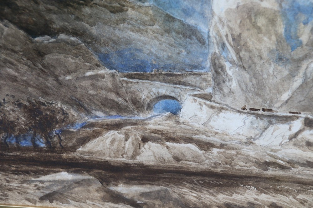 A framed 19th-century watercolour painting depicting the mountainous Pass of Llanberis in North Wales under a blue sky, set within a molded oak frame with a gilt slip. View VII