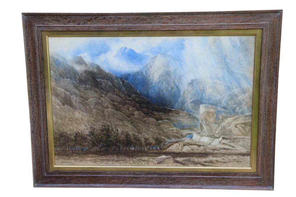 A framed 19th-century watercolour painting depicting the mountainous Pass of Llanberis in North Wales under a blue sky, set within a molded oak frame with a gilt slip. View XII