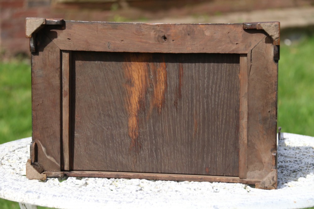 A Victorian figured walnut table mirror featuring an arched swivelling glass set above a slant-front miniature bureau base with a lower drawer. View VIII