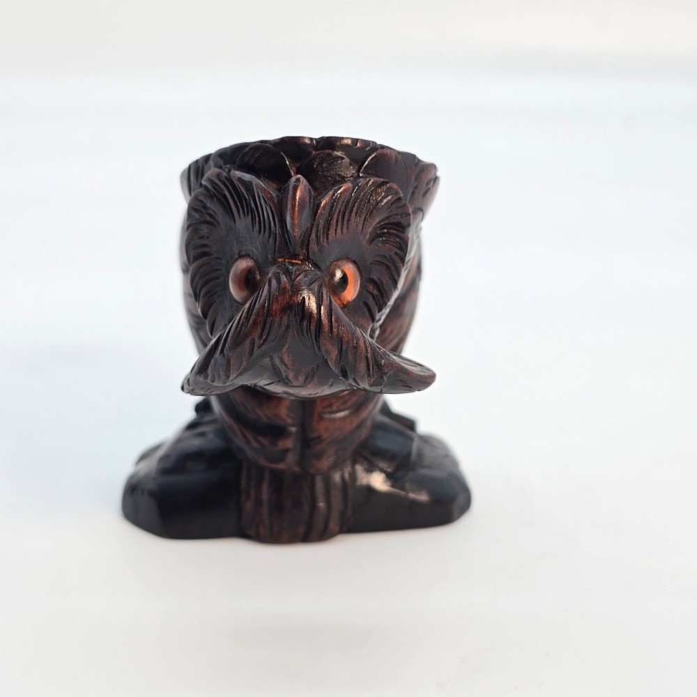 A rare Swiss/Black Forest owl match holder View IX