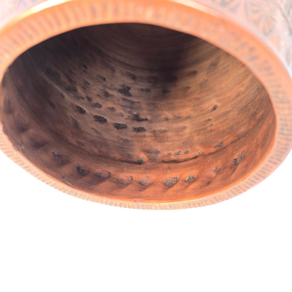 A round terracotta vase decorated with bands of relief-carved Greek classical figures, scrollwork, and geometric meander patterns. View VI