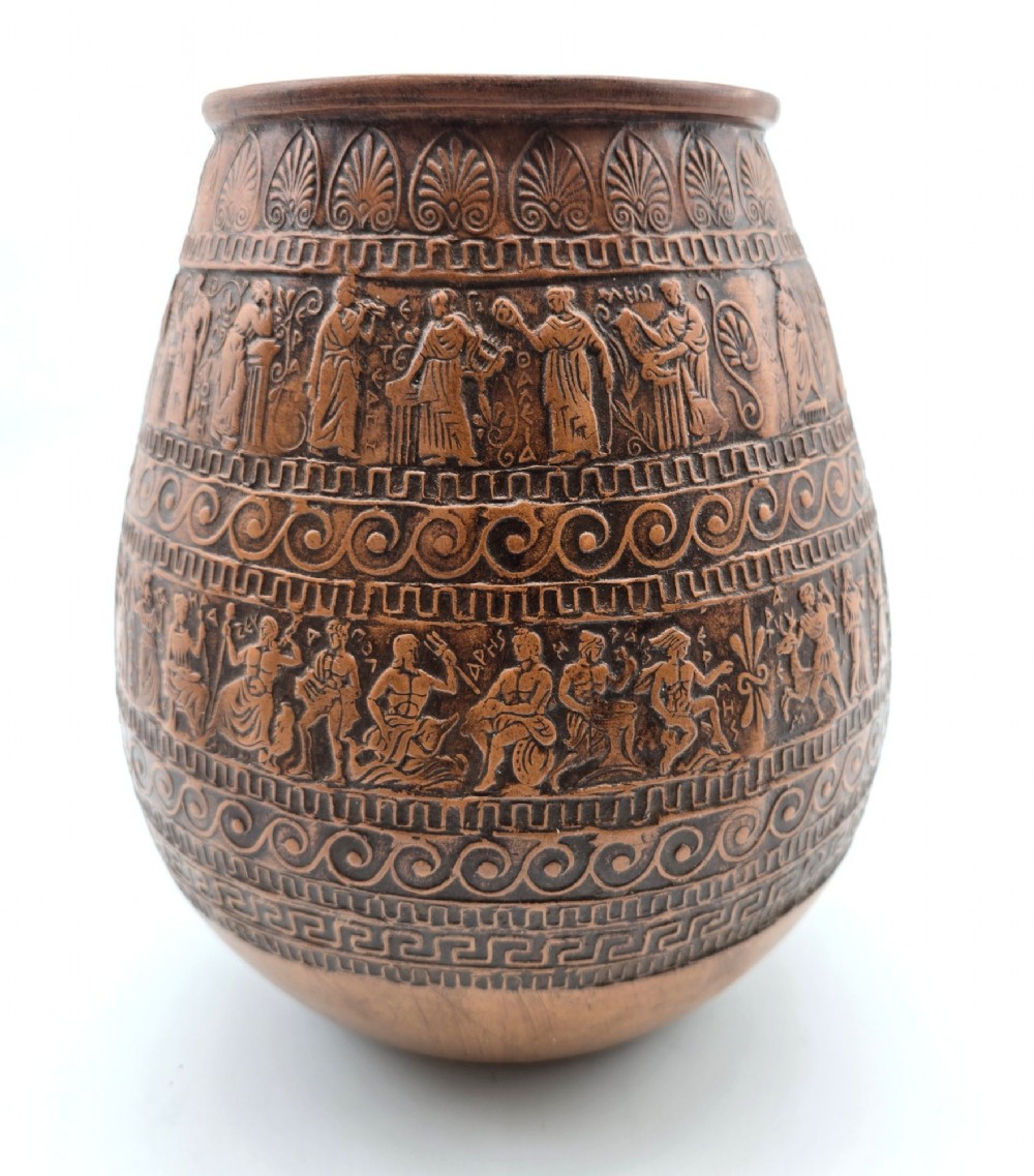 A round terracotta vase decorated with bands of relief-carved Greek classical figures, scrollwork, and geometric meander patterns. View IX