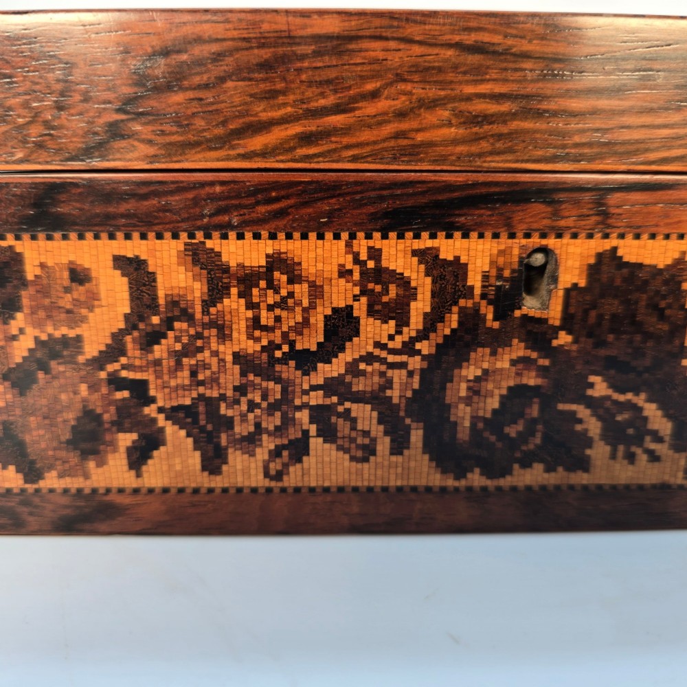 Rectangular dark rosewood jewellery box decorated with Tunbridge Ware micro-marquetry geometric patterns and a floral mosaic band around the base. View XIII