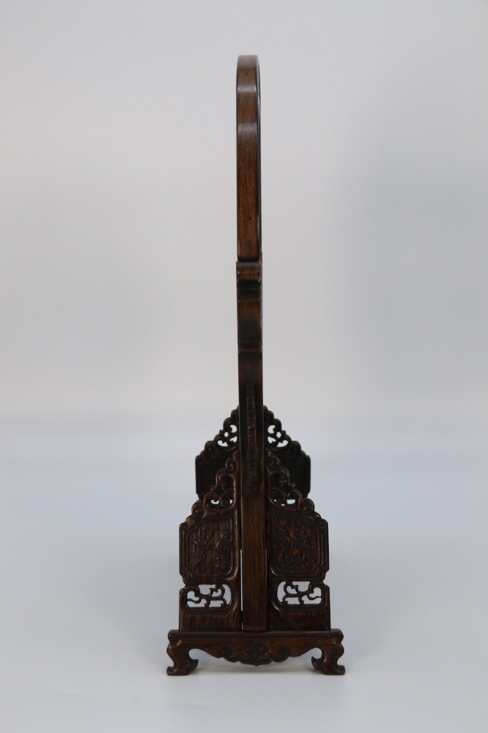 A circular double-sided silk embroidery depicting cranes among pink flowers, set within a rotating carved dark hardwood frame and stand. View XV