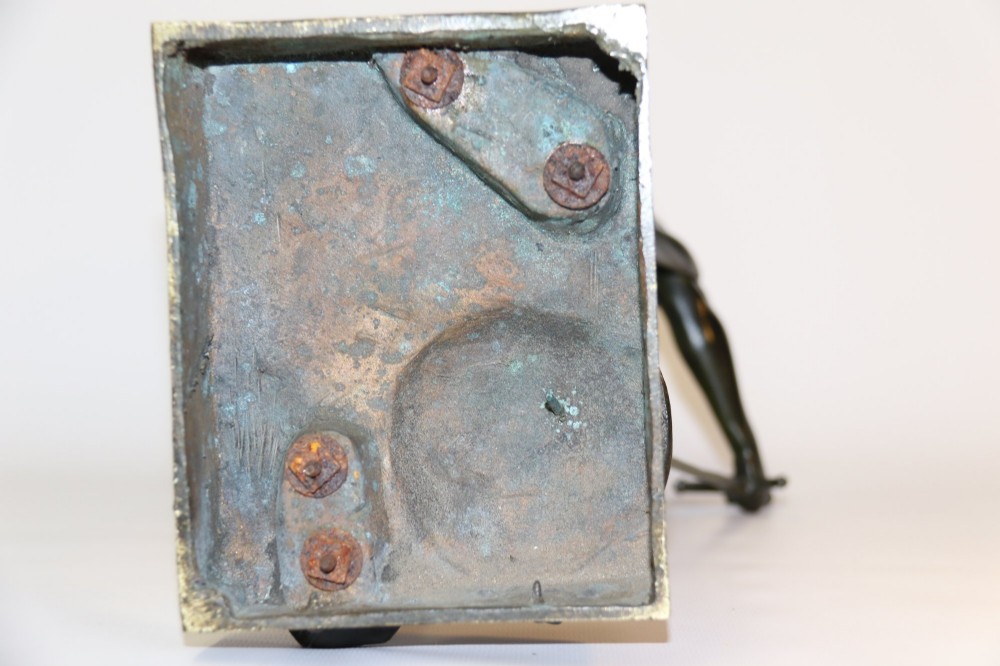 A late 19th-century patinated dark bronze sculpture depicting a Roman warrior with a sword resting against a shield on a rectangular base. View VIII