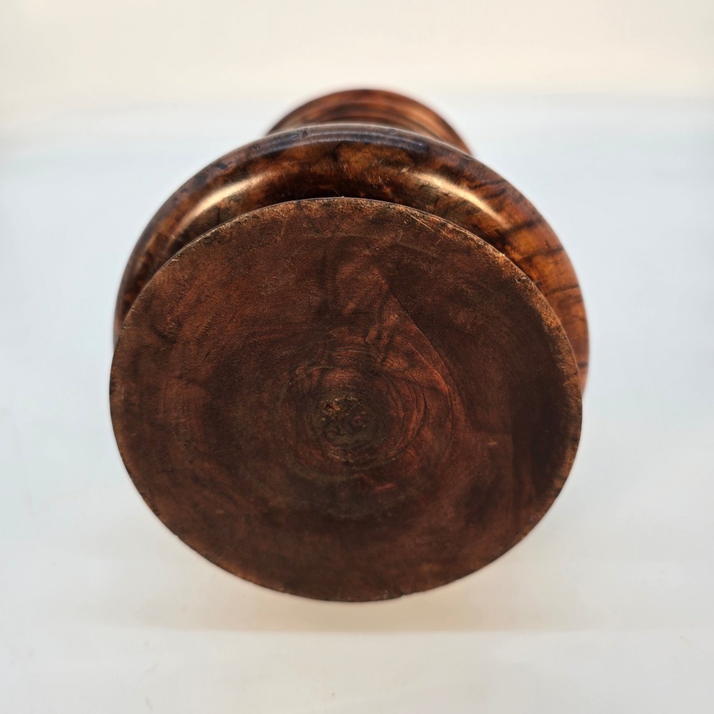 An 18th-century turned walnut wooden tobacco jar featuring a knopped finial lid, turned mouldings, and a dark aged grain surface. View IX