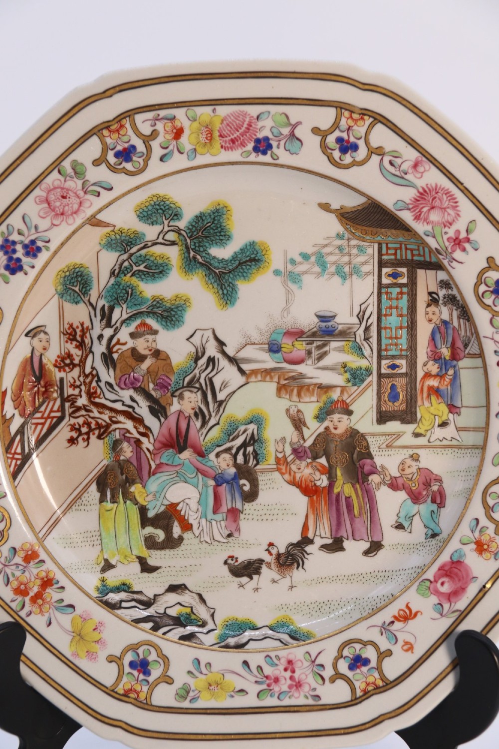 A pair of early nineteenth-century octagonal Spode stone china cabinet plates decorated with polychrome Chinoiserie garden scenes and floral borders. View III