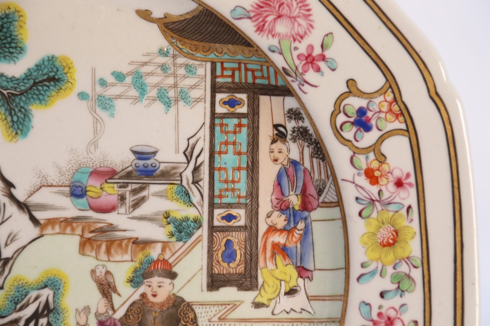 A pair of early nineteenth-century octagonal Spode stone china cabinet plates decorated with polychrome Chinoiserie garden scenes and floral borders. View VI