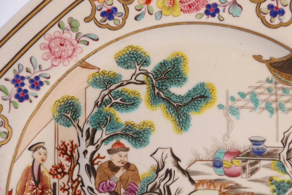 A pair of early nineteenth-century octagonal Spode stone china cabinet plates decorated with polychrome Chinoiserie garden scenes and floral borders. View VII