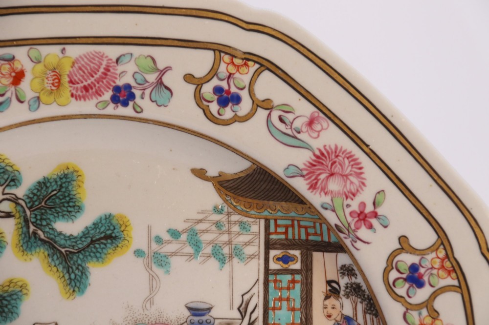 A pair of early nineteenth-century octagonal Spode stone china cabinet plates decorated with polychrome Chinoiserie garden scenes and floral borders. View X