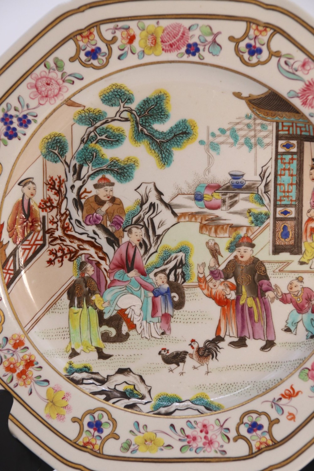 A pair of early nineteenth-century octagonal Spode stone china cabinet plates decorated with polychrome Chinoiserie garden scenes and floral borders. View XII