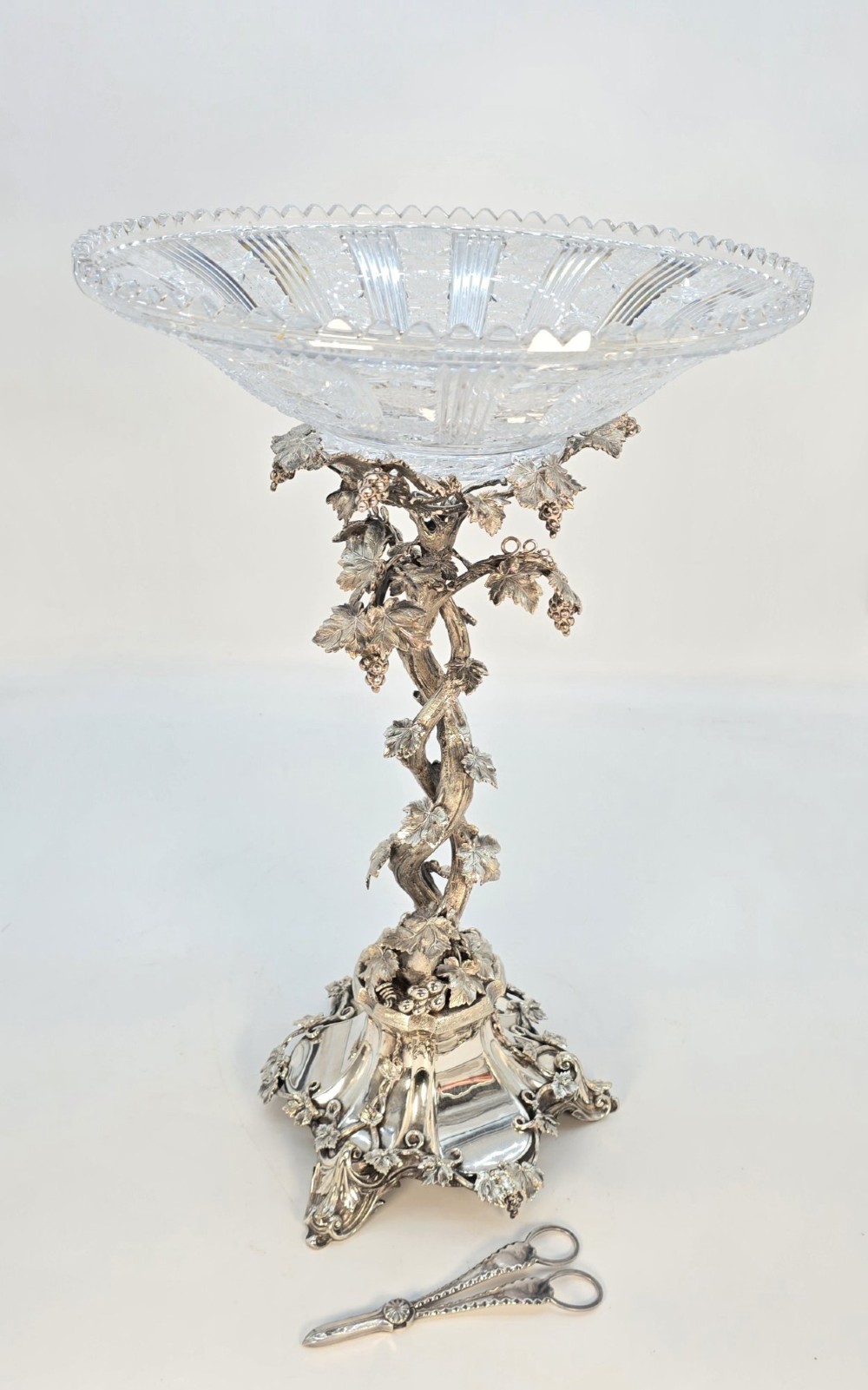 A Victorian silver-plated table centrepiece featuring an intertwined grapevine stem supporting a cut glass bowl. View II
