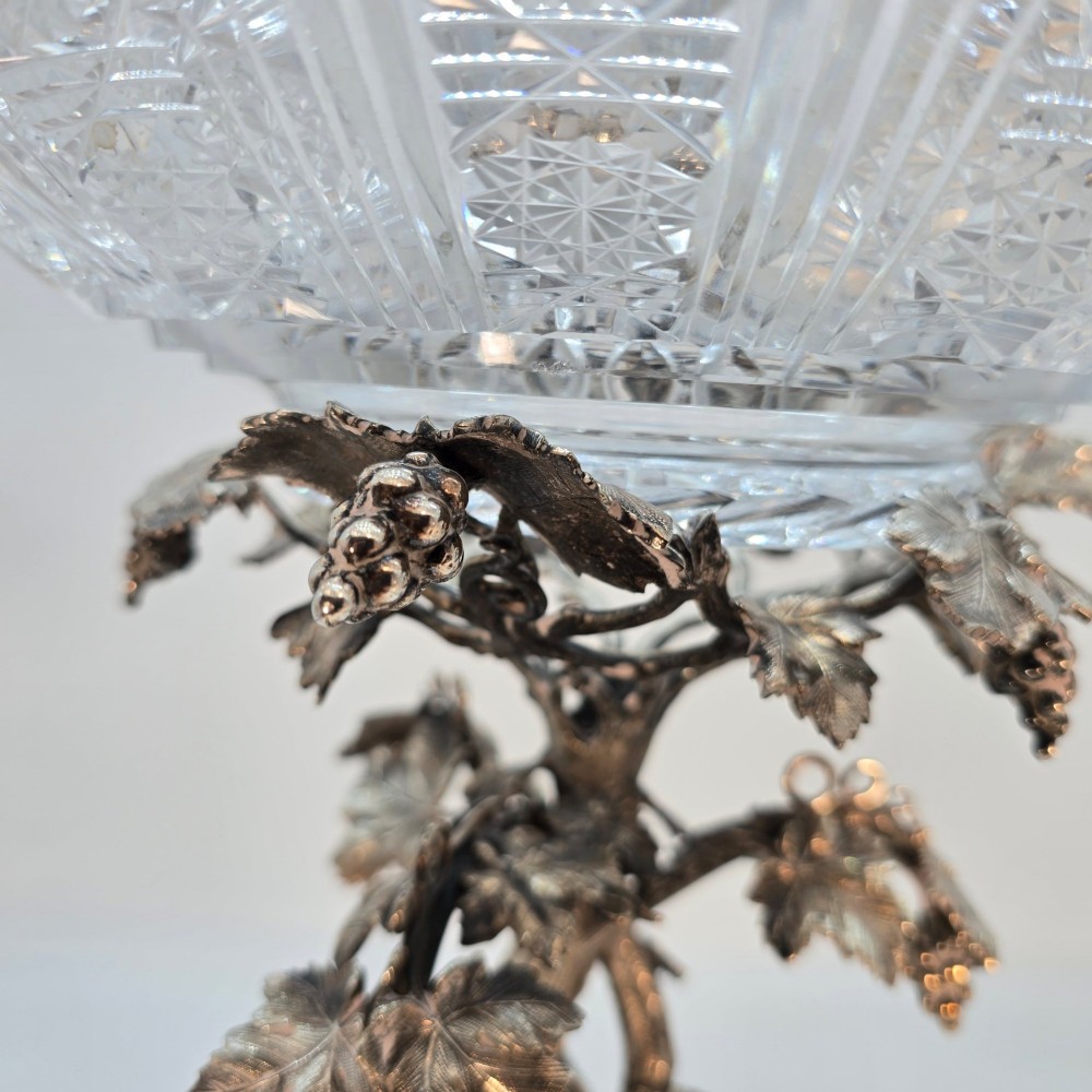 A Victorian silver-plated table centrepiece featuring an intertwined grapevine stem supporting a cut glass bowl. View VIII