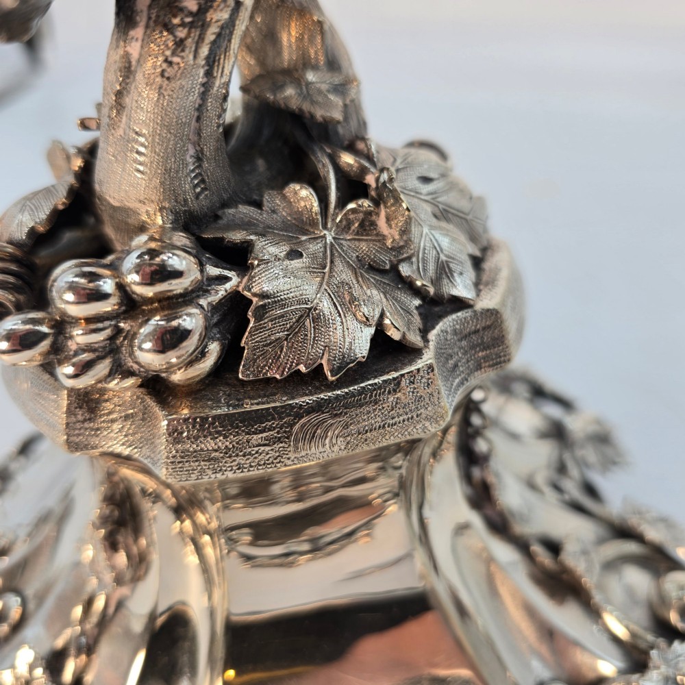 A Victorian silver-plated table centrepiece featuring an intertwined grapevine stem supporting a cut glass bowl. View IX