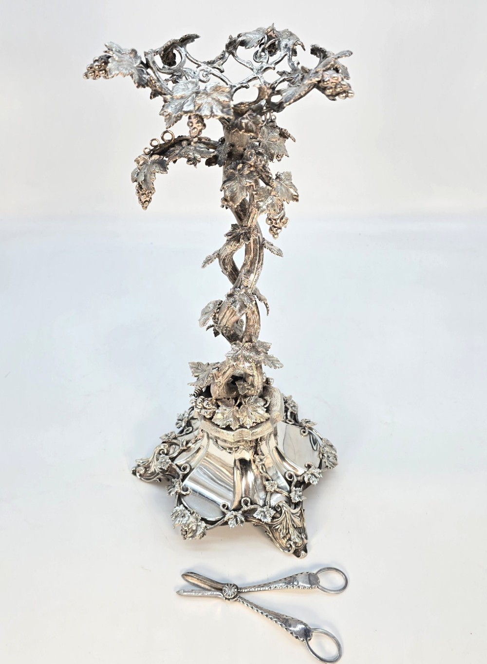 A Victorian silver-plated table centrepiece featuring an intertwined grapevine stem supporting a cut glass bowl. View XII