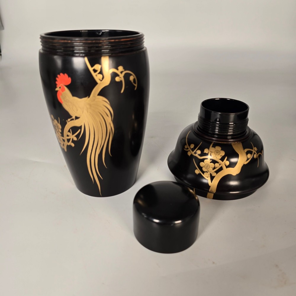 A black and gold hand-painted Japanese lacquer cocktail set comprising a shaker, six stemmed glasses, and a rectangular tray adorned with rooster motifs. View V