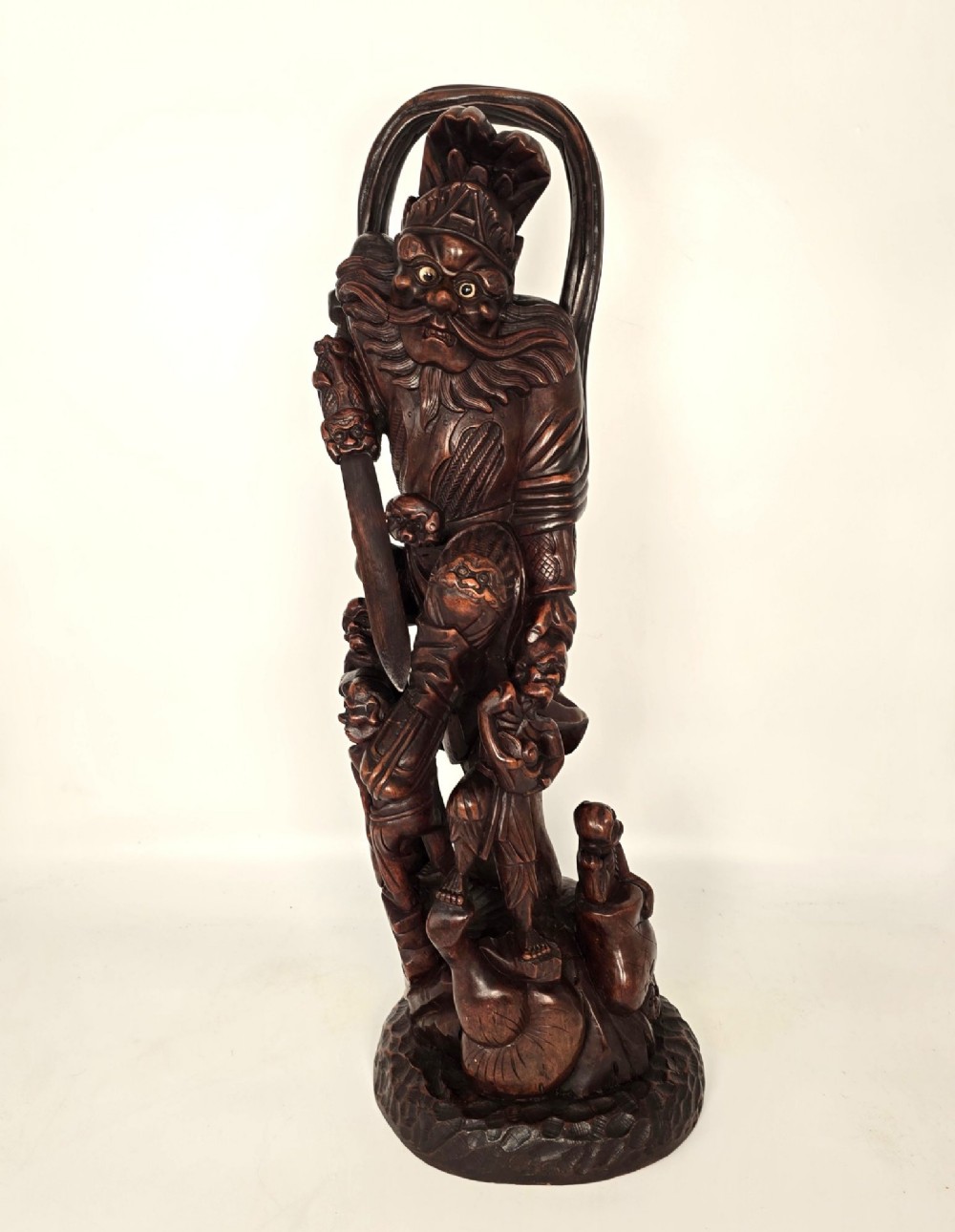 Monumental Chinese carved hardwood sculpture of a Guardian King (Lokapala)