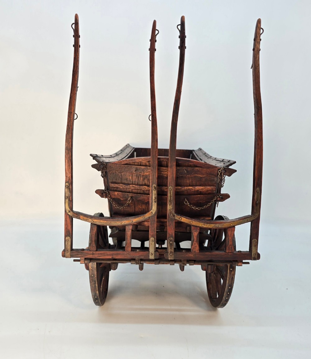 A detailed dark wood scale model of an English twin horse-drawn farm hay cart featuring spoked wheels, iron hardware, and wooden shafts. View VIII