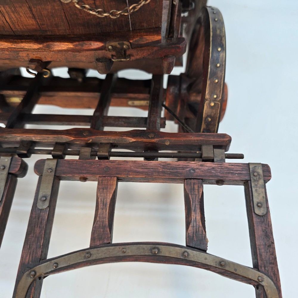 A detailed dark wood scale model of an English twin horse-drawn farm hay cart featuring spoked wheels, iron hardware, and wooden shafts. View X