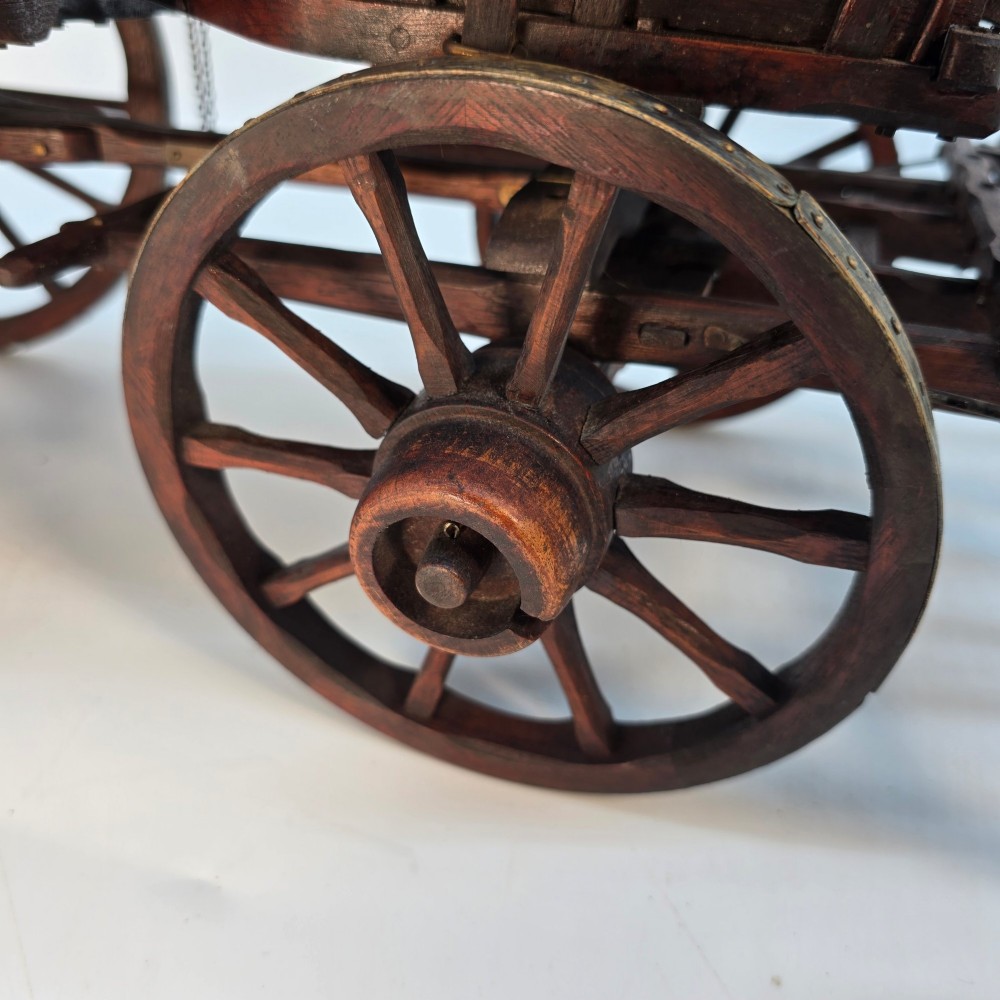 A detailed dark wood scale model of an English twin horse-drawn farm hay cart featuring spoked wheels, iron hardware, and wooden shafts. View XIV
