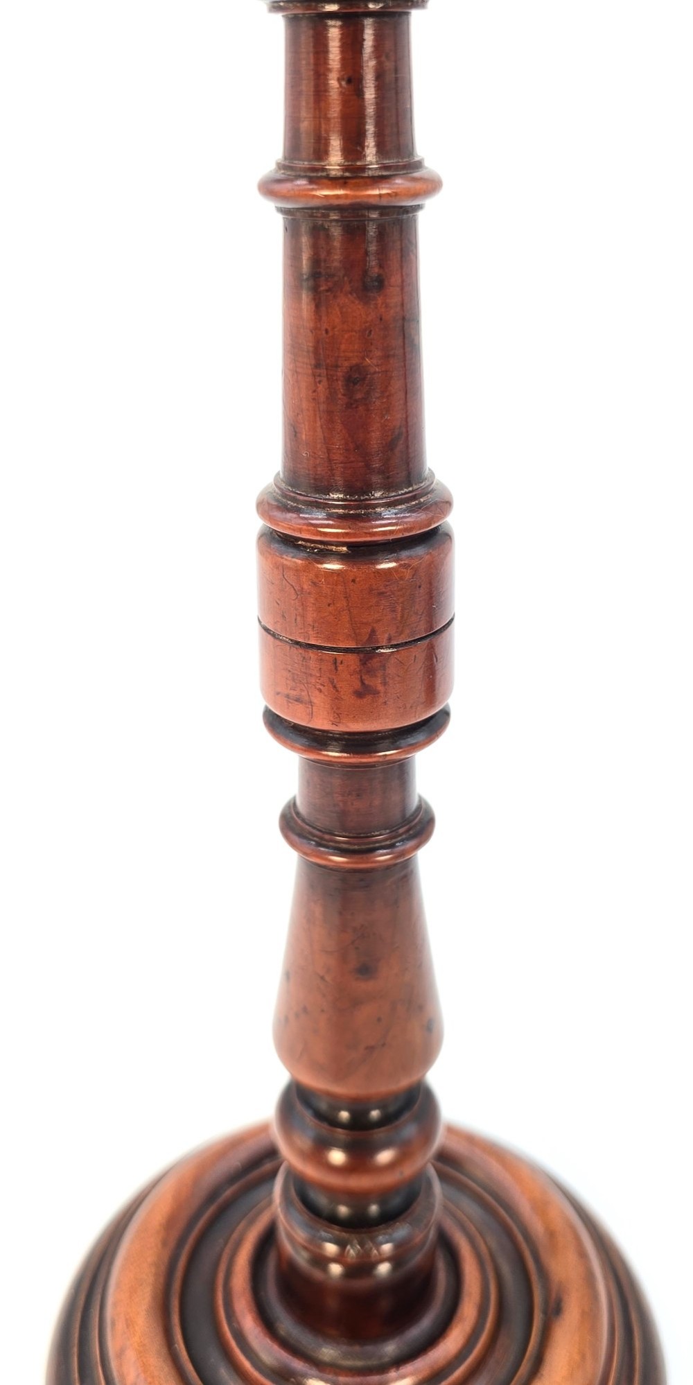 A pair of turned early eighteenth-century yew wood wig stands featuring domed tops, knopped baluster shafts, and turned circular bases. View VI