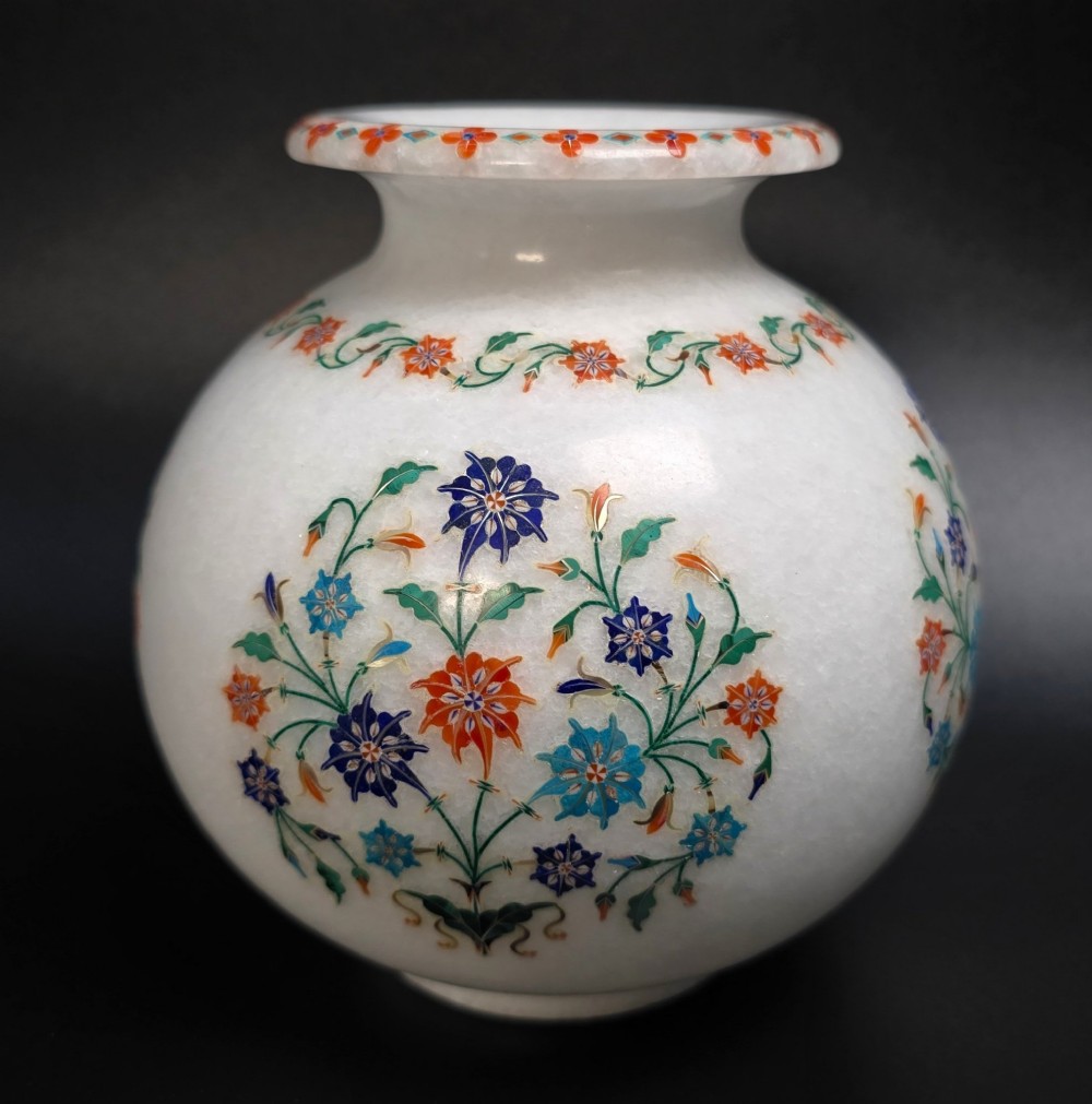 A globular white marble vase adorned with detailed floral pietra dura inlay using multi-coloured semi-precious stones. View III