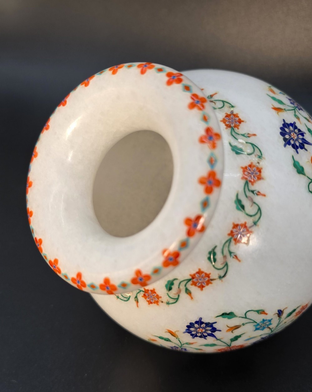 A globular white marble vase adorned with detailed floral pietra dura inlay using multi-coloured semi-precious stones. View XII