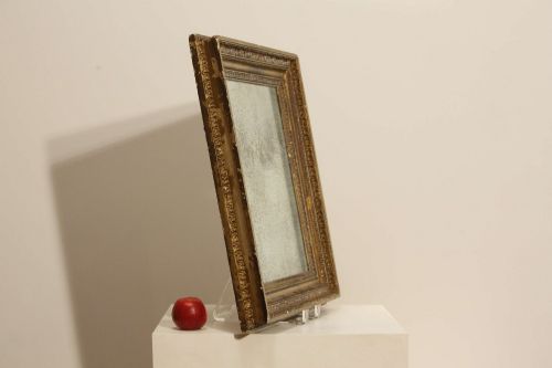 fig 2. A 19th-century French rectangular giltwood wall mirror featuring a moulded frame with detailed borders and a heavily foxed glass plate.