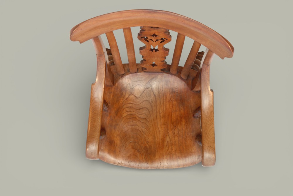 A late 19th-century Victorian Windsor armchair made from fruitwood and elm with a pierced back splat, turned legs, and a shaped seat. View XIII