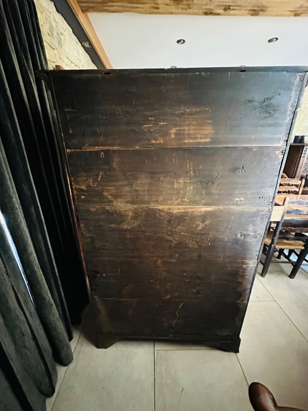 A tall Victorian walnut chest of drawers featuring three upper small drawers above five graduated full-width drawers with ornate brass handles. View VIII