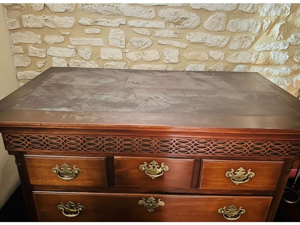 A tall 19th-century walnut chest of drawers featuring a carved fretwork frieze, brass backplate handles, and graduated drawer fronts. View XI